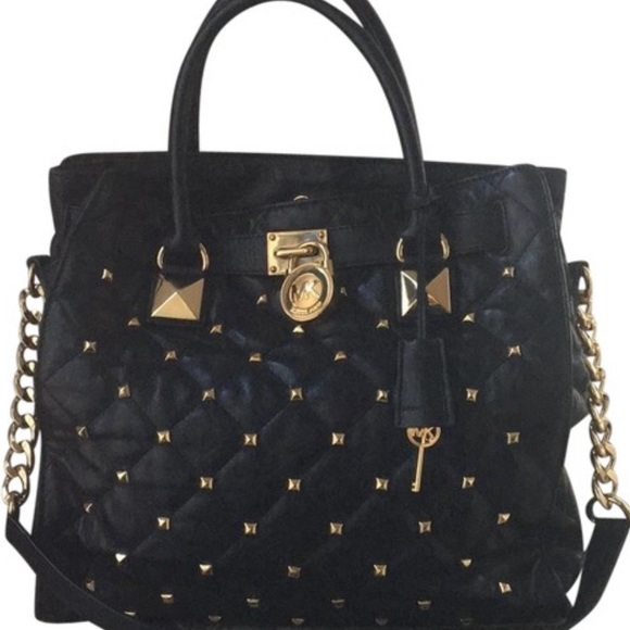 Handbags - Michael Kors purse.